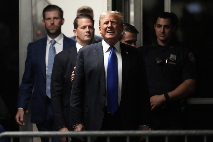 epa11380500 Former President Donald Trump comments to members of the media while returning to the courtroom in his criminal trial at New York State Supreme Court in New York, New York, USA, 30 May 202 ...