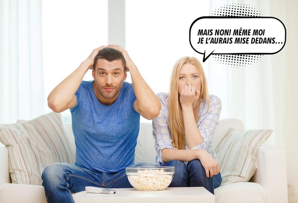 food, love, family, sports, entretainment and happiness concept - upset couple after sports team loss