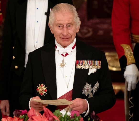 South Korean President state visit to the UK President of South Korea Yoon Suk Yeol listens as King Charles III speaks at the state banquet at Buckingham Palace, London, for the state visit to the UK  ...