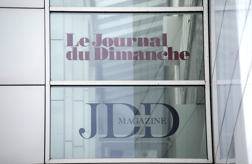 A poster advertising for the Journal du Dimanche, know as JDD , is seen outside the Lagardere News headquarters Tuesday, Aug. 1, 2023 in Paris. The journalists of French emblematic Sunday newspaper Le ...