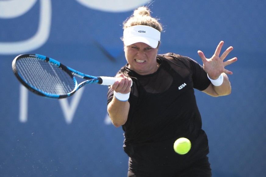 Kim Clijsters, of Belgium, hits a forehand against Su-Wei Hsieh, of Taiwan during her first round match in the Chicago Fall Tennis Classic tournament, Monday, Sept. 27, 2021, in Chicago. (AP Photo/Mat ...