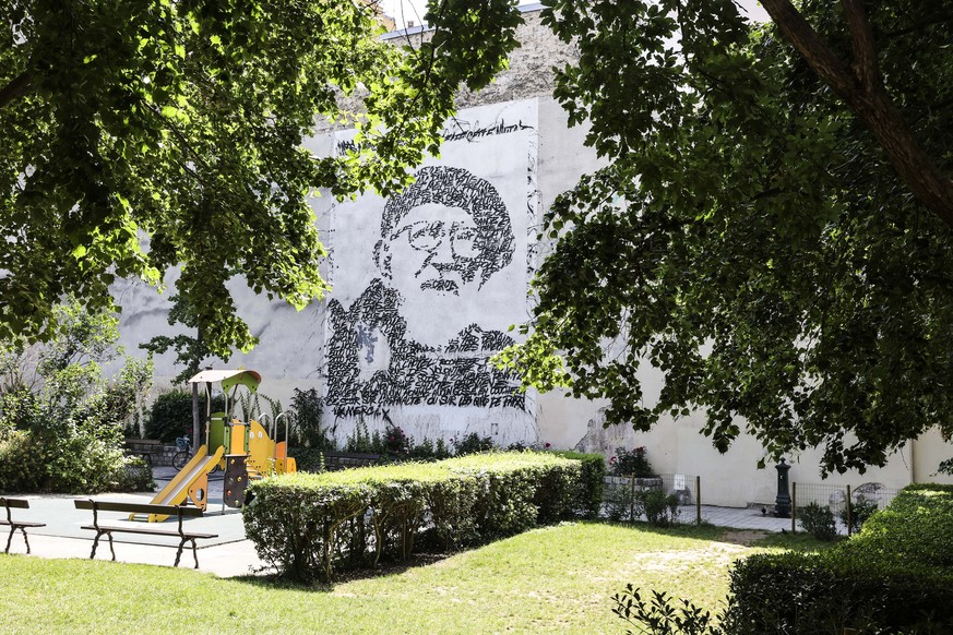 epa11487367 A street art mural with the portrait of late Abbe Pierre, co-founder of the Emmaus movement against social exclusion, by artist JonOne, at Square des Deux-Nethes in Paris, France, 19 July  ...