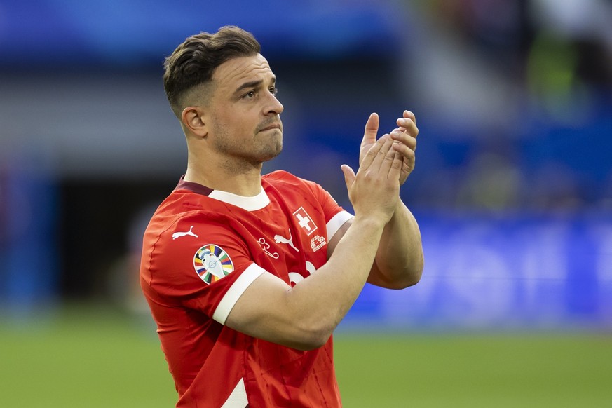 Switzerland&#039;s Xherdan Shaqiri is disappointed after losing the penalty shoot-out of the quarter final match between England and Switzerland at the Euro 2024 soccer tournament in Duesseldorf, Germ ...