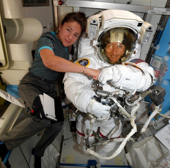 In this photo provided by NASA on Friday, Oct. 4, 2019, astronauts Christina Koch, right, and, Jessica Meir pose for a photo on the International Space Station. (NASA via AP)
Space Station-25th Annive ...