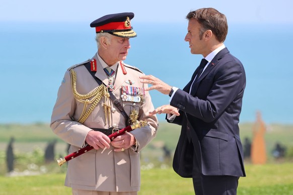 VER-SUR-MER, FRANCE - JUNE 06: King Charles III and President of France, Emmanuel Macron attend the UK Ministry of Defence and the Royal British Legion’s commemorative event at the British Normandy Me ...