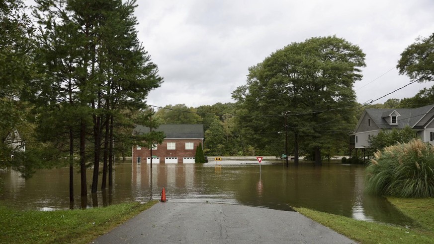 Residents at Riverside Drive areas are being evacuated as water continues to rise after Hurricane Helen passed the area Friday, Sept. 27, 2024 in Charlotte, N.C. (Melissa Melvin-Rodriguez/The Charlott ...