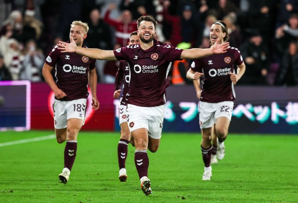 EDINBURGH, SCOTLAND - OCTOBER 04: Hearts Craig Halkett celebrates after scoring to make it 1-0 during a William Hill Premiership match between Heart of Midlothian and Hibernian at Tynecastle Park, on  ...