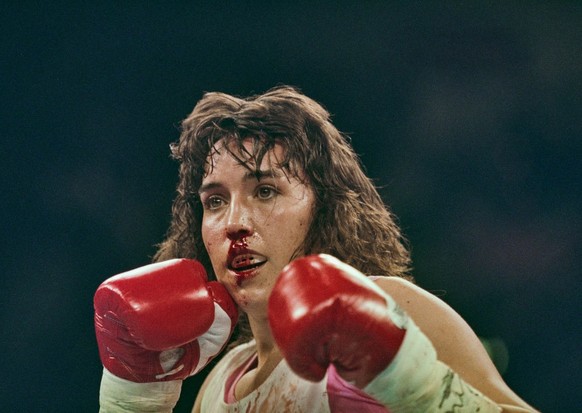 Boxer Christy Martin from the United States bleeds from the nose during the WBC Championship Boxing Lightweight fight against Deirdre Gogarty of Ireland on 16th March 1996 at the MGM Grand Garden Aren ...