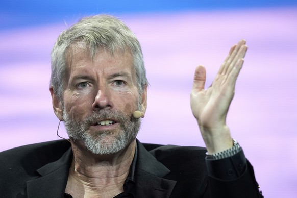 FILE - Michael Saylor, chairman and CEO of MicroStrategy, speaks during a panel discussion at the Bitcoin Conference, April 7, 2022, in Miami Beach, Fla. (AP Photo/Rebecca Blackwell, File)
Trump Crypt ...