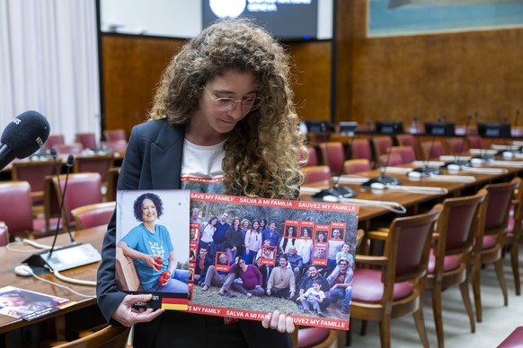 Noam Har Tzvi, a friend of Shoshan Haran who was kidnapped with 9 members of her family by Hamas terrorists on October 7, speaks during an interview, at the European headquarters of the United Nations ...