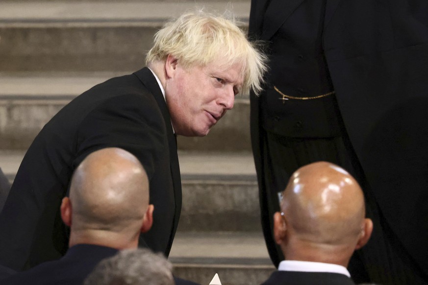 Former British Prime Minister Boris Johnson arrives ahead of the arrival of King Charles III and the Queen Consort at Westminster Hall, where both Houses of Parliament are meeting to express their con ...