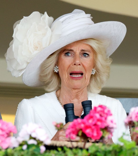 ASCOT, UNITED KINGDOM - JUNE 20: (EMBARGOED FOR PUBLICATION IN UK NEWSPAPERS UNTIL 24 HOURS AFTER CREATE DATE AND TIME) King Charles III and Queen Camilla watch, from the Royal Box, their horse &#039; ...