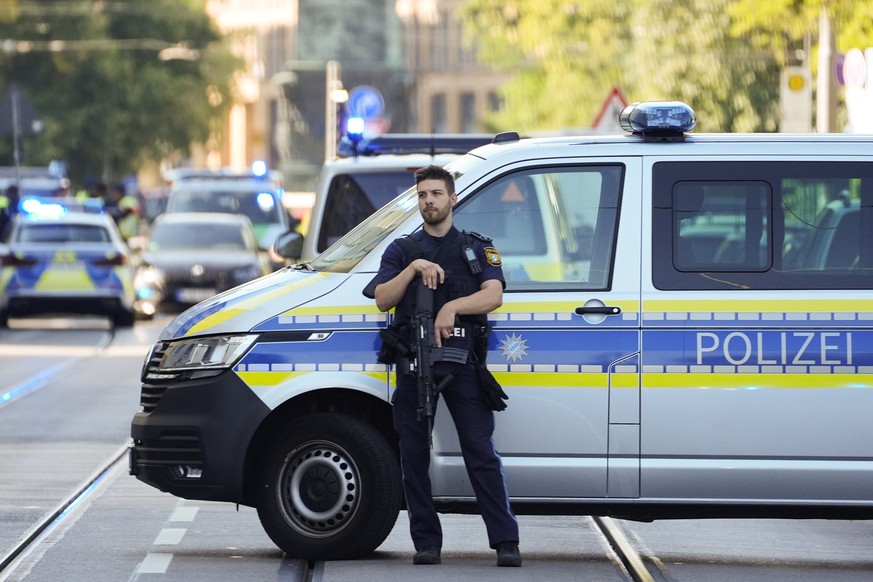 Police officer block a street after police fired shots at a suspicious person near the Israeli Consulate and a museum on the city&#039;s Nazi-era history in Munich, Germany, Thursday, Sept. 5, 2024. ( ...