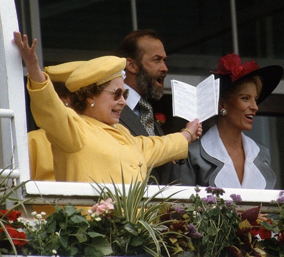 EPSOM, ENGLAND - JUNE 01: Queen Elizabeth II watches the racing from the royal balcony at the Epsom Derby at Epsom Racecourse on June 1, 2019 in Epsom, England. (Photo by Mark Cuthbert/UK Press via Ge ...