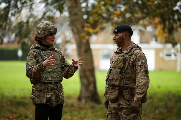 DEREHAM, ENGLAND - NOVEMBER 8: Catherine, Princess of Wales gestures as she visits The Queen's Dragoon Guards Regiment for the first time as their Colonel in Chief on November 8, 2023 in Dereham, ...