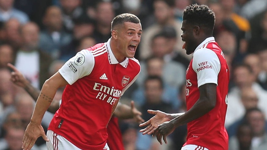 Arsenal v Tottenham Hotspur 01 October 2022 London - Premier League Football - Arsenal FC v Tottenham Hotspur - Granit Xhaka of Arsenal and Thomas Partey of Arsenal celebrate the opening goal. Photo b ...