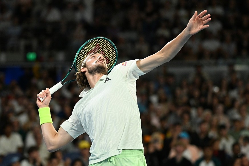 epa11093195 Stefanos Tsitsipas of Greece prepares to serve during his 4th round match against Taylor Fritz of the USA on Day 8 of the 2024 Australian Open at Melbourne Park in Melbourne, Australia, 21 ...