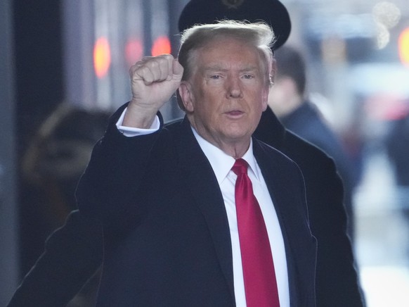 Former President Donald Trump leaves his apartment building in New York, Wednesday, Jan. 17, 2024. Trump plans to attend the penalty phase of a New York civil defamation trial stemming from a columnis ...