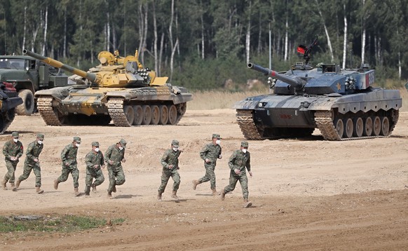 epa10132451 Soldiers from China take part in the International Army Games ARMI-2022 at the Alabino training and tactical complex outside Moscow, Russia, 21 August 2022. The event runs until 27 August. ...