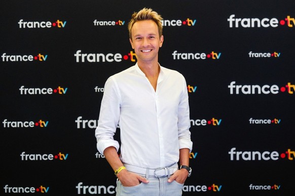 (FILES) French TV host Cyril Feraud poses during a photocall before a press conference to present the new season of France Televisions audiovisual group in Paris on July 8, 2025. Cyril Feraud will bec ...