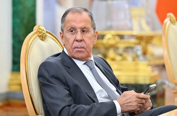 epa11649250 Russian Foreign Minister Sergey Lavrov sits during a meeting of Russian President Vladimir Putin and Armenian Prime Minister Nikol Pashinyan at a meeting of the heads of state of the Commo ...