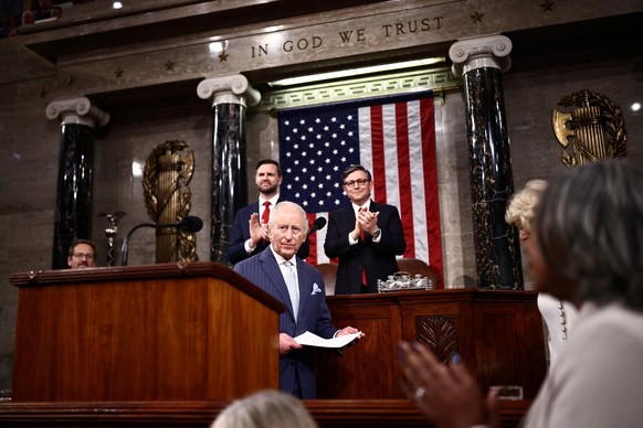 U.S. Vice President JD Vance and U.S. House Speaker Mike Johnson (R-LA) applaud Britain's King Charles on the day he addresses a joint meeting of Congress in the House Chamber of the U.S. Capitol ...