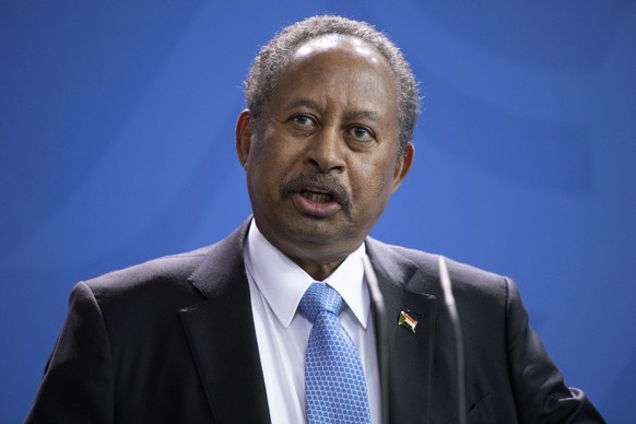 epa09544822 (FILE) - Prime Minister of Sudan Abdalla Hamdok delivers a statement at the German federal chancellery in Berlin, Germany, 14 February 2020 (reissued 25 October 2021). Abdalla Hamdok was p ...