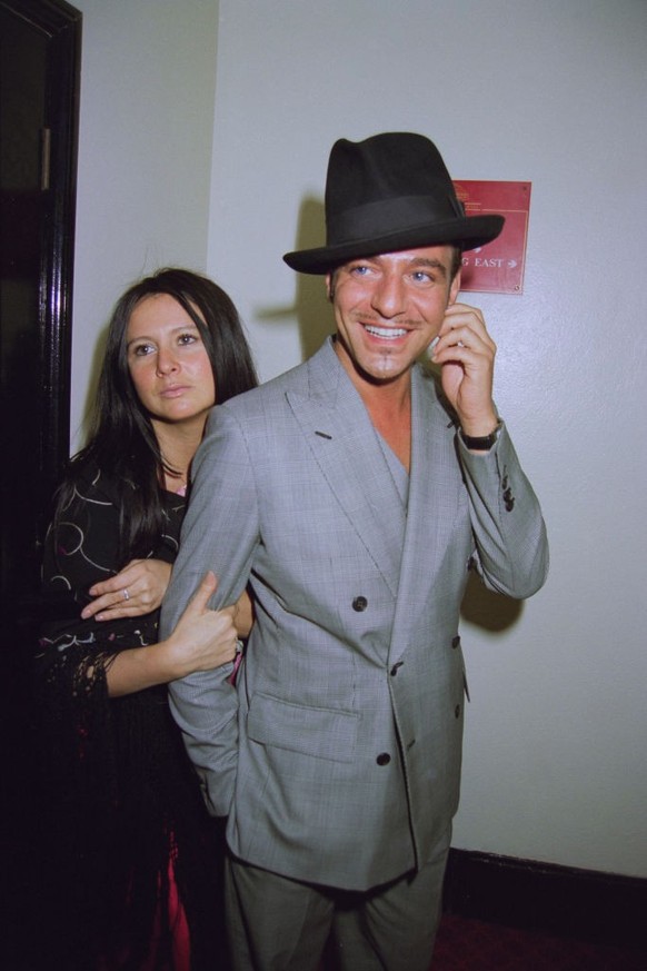 British fashion designer John Galliano and Fran Cutler at the Royal Albert Hall for Joaquín Cortés' 'Gipsy Passion' show, London, 13th April 1997. (Photo by Dave Benett/Getty Images)