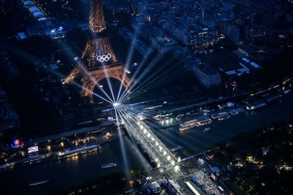 PARIS, FRANCE - JULY 26: An aerial view of the Olympic Rings on the Eiffel Tower taken from a helicopter during the opening ceremony of the Olympic Games Paris 2024 on July 26, 2024 in Paris, France.  ...