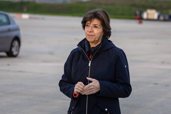 epa10591816 French Foreign Affairs Minister Catherine Colonna stands on the tarmac as evacuees from Sudan are expected to arrive at Roissy CDG airport, near Paris, France 26 April 2023. Some 245 passe ...