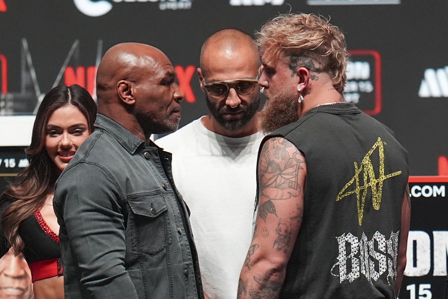 Mike Tyson, front left, and Jake Paul, front right, face off during a news conference ahead of their fight, Wednesday, Nov. 13, 2024, in Irving, Texas. (AP Photo/Julio Cortez)
Newsmaker Names