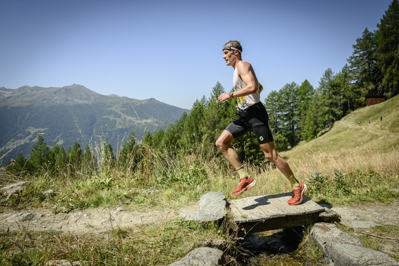 epa12290870 Adrien Briffod from Switzerland in action during the 52nd Sierre-Zinal long distance mountain race in Zinal, Switzerland, 09 August 2025. Approximately 6850 runners took part in different  ...