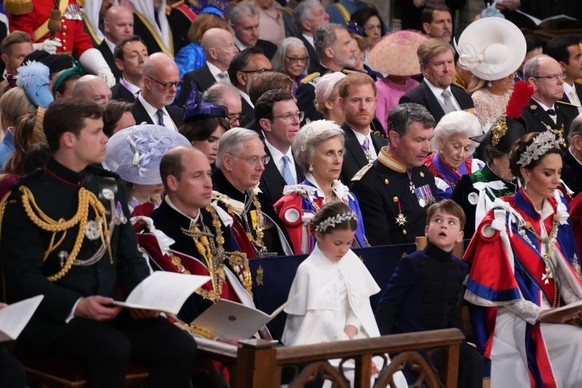 LONDON, ENGLAND - MAY 06: (front, left to right) Princ William, The Prince of Wales, Princess Charlotte, Prince Louis and Catherine, Princess of Wales with the Duke of Sussex sat in the third row, at  ...