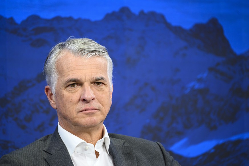 epa11084860 Swiss Bank UBS Group Chief Executive Officer Sergio Ermotti looks on during a panel session of the 54th annual meeting of the World Economic Forum (WEF), in Davos, Switzerland, 17 January  ...