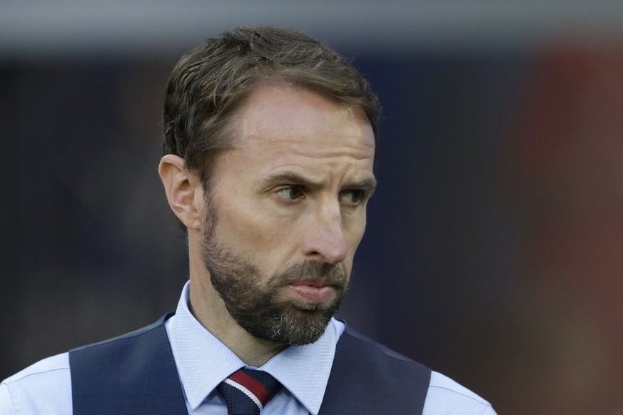 England head coach Gareth Southgate walks onto the pitch prior to the group G match between England and Belgium at the 2018 soccer World Cup in the Kaliningrad Stadium in Kaliningrad, Russia, Thursday ...