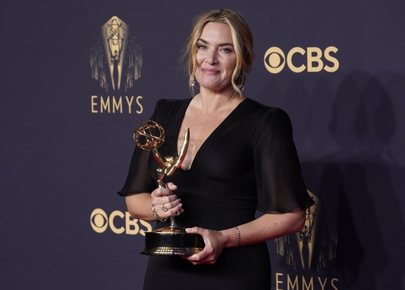 FILE - Kate Winslet, winner of the award for outstanding lead actress in a limited or anthology series or movie for &quot;Mare of Easttown&quot; poses at the 73rd Primetime Emmy Awards on Sunday, Sept ...