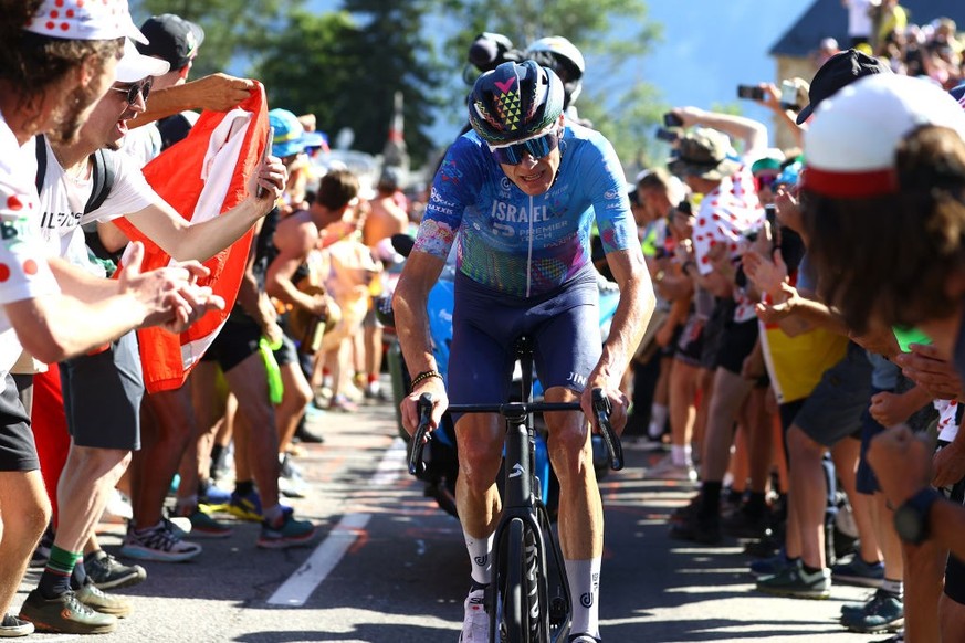 ALPE D&#039;HUEZ, FRANCE - JULY 14: Christopher Froome of United Kingdom and Team Israel - Premier Tech competes in the breakaway passing through The Dutch corner climbing to the L&#039;Alpe d&#039;Hu ...
