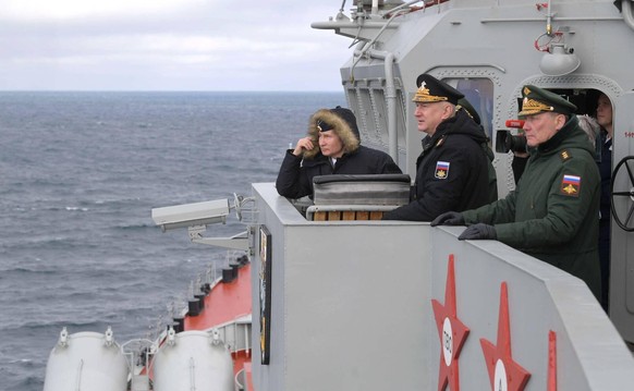 January 9, 2020. - Russia, Crimea. - The Supreme Commander-in-Chief of the Russian Armed Forces, Russian President Vladimir Putin (left) views a joint exercise by the Northern and the Black Sea Fleets ...