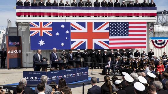 epaselect epa10521429 (L-R) Australian Prime Minister Anthony Albanese, US President Joe Biden and United Kingdom Prime Minister Rishi Sunak hold a press conference at the Naval Base Point Miramar in  ...