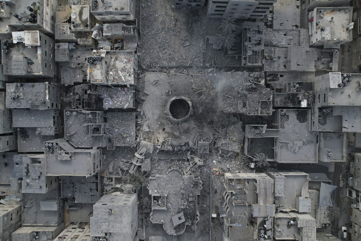 The rubble of the Yassin Mosque, destroyed in an Israeli airstrike, is seen at Shati refugee camp in Gaza City early Monday, Oct. 9, 2023. Israel&#039;s military battled to drive Hamas fighters out of ...