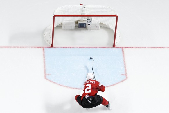 Switzerland&#039;s forward Nino Niederreiter scores the 0:3 in the empty net, during the IIHF 2023 World Championship preliminary round group B game between Norway and Switzerland, at the Riga Arena,  ...