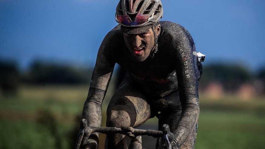 epa09504683 Italian rider Gianni Moscon of Ineos Grenadiersteam in action during the Paris-Roubaix cycling race over 257km from Compiegne to Roubaix, France, 03 October 2021. EPA/CHRISTOPHE PETIT TESS ...