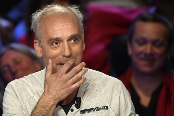 epa05888891 French presidential election candidate for the far-left New Anticapitalist Party (NPA) Philippe Poutou reacts during a debate organised by the French private TV channels BFM TV and CNews,  ...
