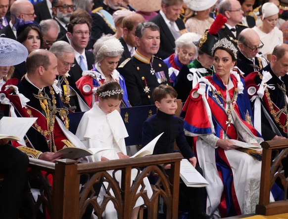 LONDON, ENGLAND - MAY 06: (left to right) The Prince of Wales, Princess Charlotte, Prince Louis and the Princess of Wales at the coronation ceremony of King Charles III and Queen Camilla in Westminste ...