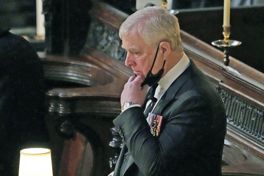 FILE ��� Britain&#039;s Prince Andrew inside St. George&#039;s Chapel during the funeral of his father, Prince Philip, at Windsor Castle, Windsor, England, April 17, 2021. When Jeffrey Epstein���s lon ...