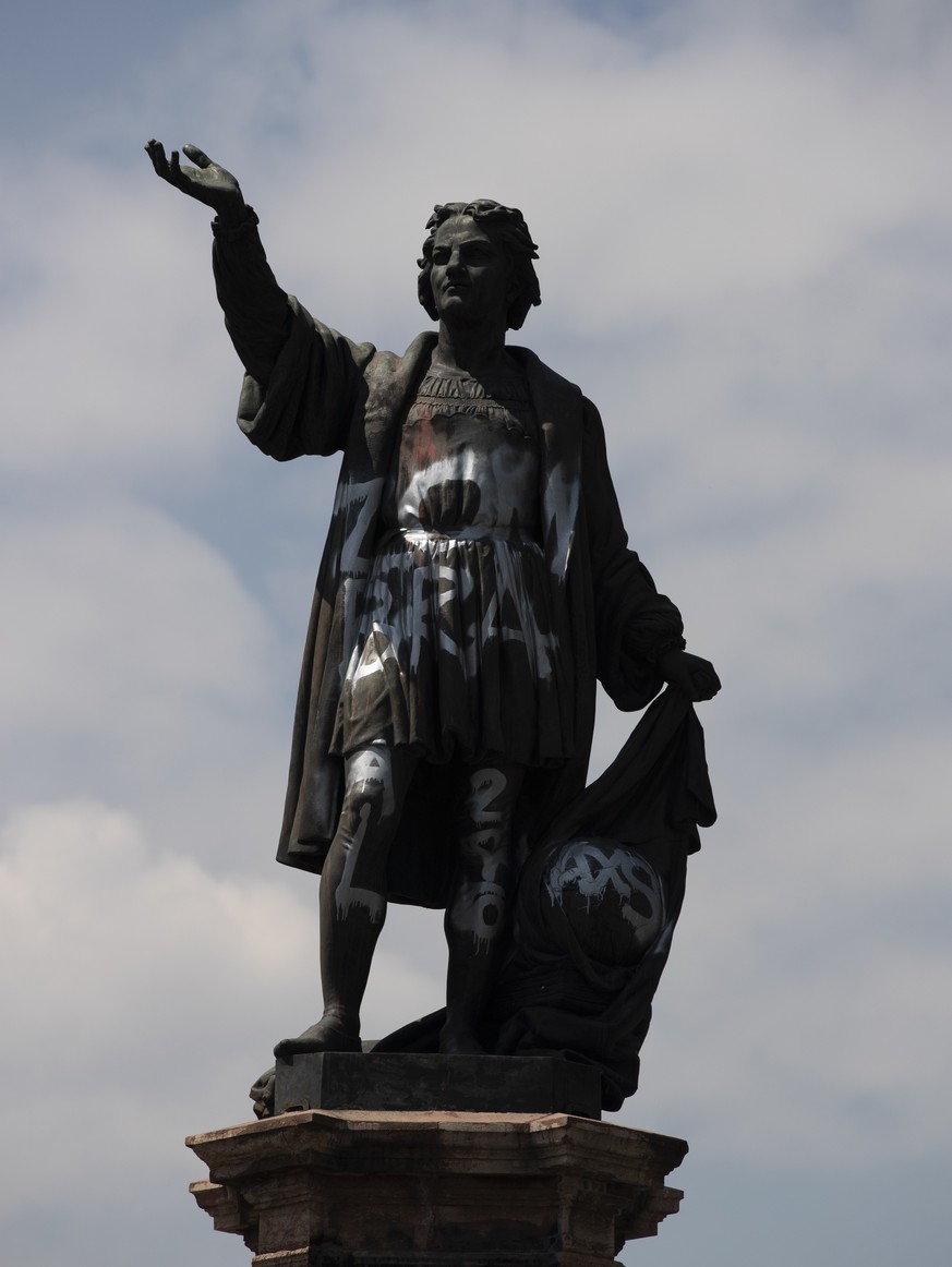 FILE - In this Sept. 28, 2020 file photo, a defaced statue of Christopher Columbus stands on Paseo de la Reforma in Mexico City. Mexico City Mayor Claudia Sheinbaum announced on Sunday, Sept. 5, 2021  ...