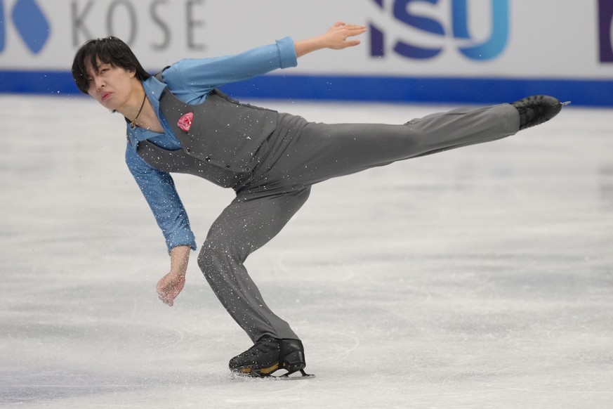 Kao Miura of Japan competes in the men's free skating of the ISU Four Continents Figure Skating Championships in Beijing, China, Sunday, Jan. 25, 2026. (AP Photo/Andy Wong)