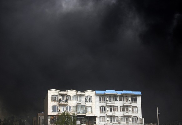 TEHRAN, IRAN - MARCH 8: Black smoke rises after fires broke out following US-Israel attacks targeting some oil storage facilities targeted, including the Shehran oil depot, in Tehran, Iran on March 8, ...