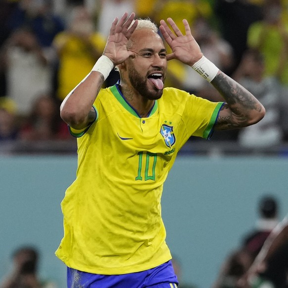 Brazil&#039;s Neymar celebrates after scoring his side&#039;s second goal during the World Cup round of 16 soccer match between Brazil and South Korea, at the Education City Stadium in Al Rayyan, Qata ...