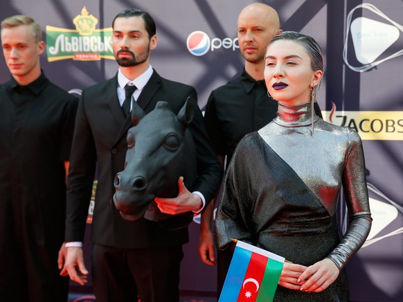 epa05948978 Dihaj from Azerbaijan (R) poses as she arrives for the opening ceremony of the 62nd annual Eurovision Song Contest (ESC) in Kiev, Ukraine, 07 May 2017. The ESC 2017 Grand Final is held on ...